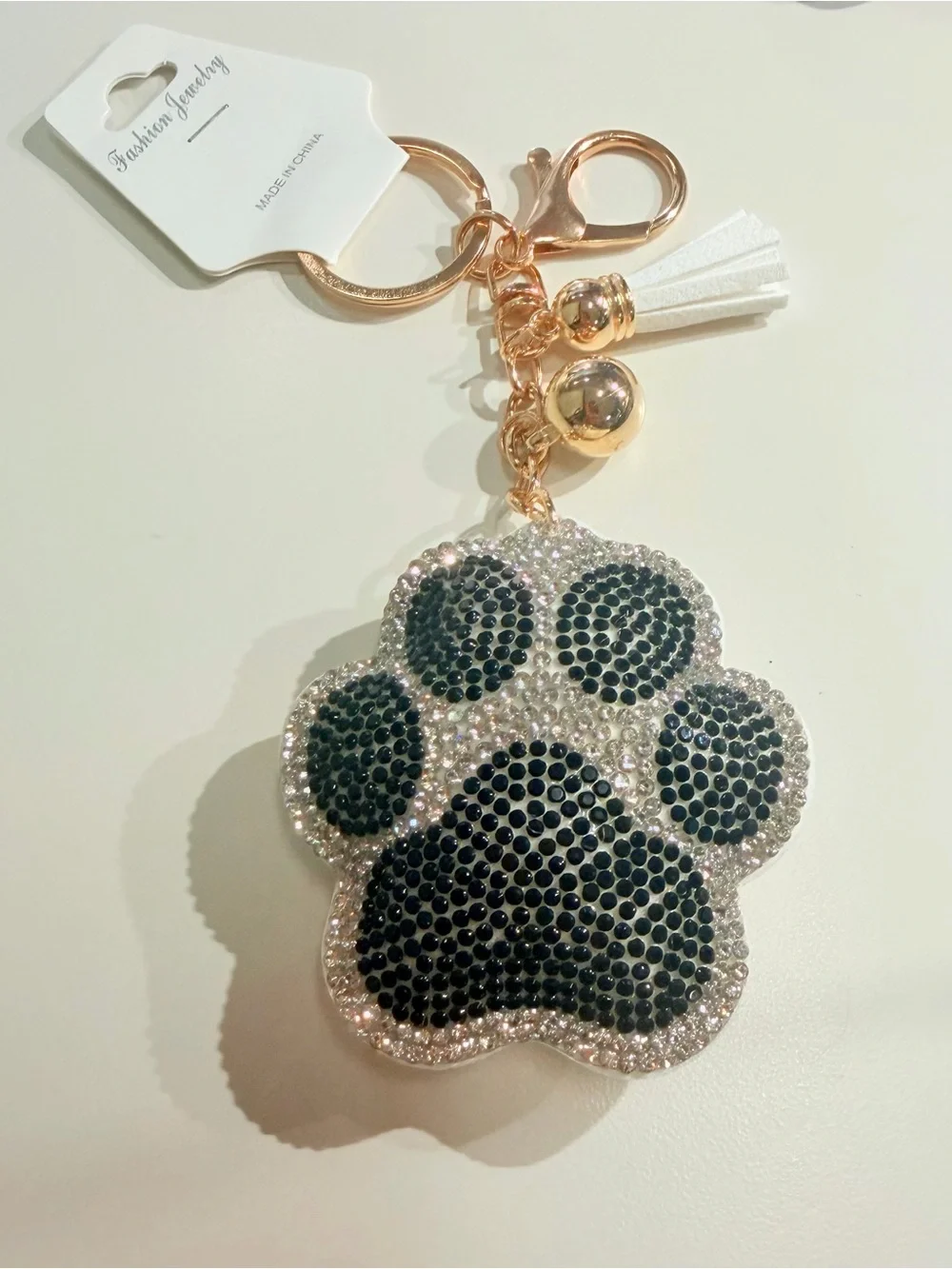 ✨NWT✨Black & Silver Paw Print Crystal Keychain with White Tassel